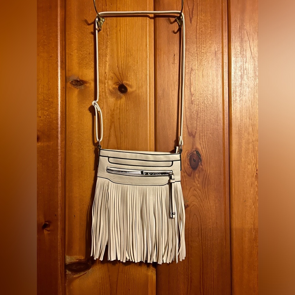 Black Rivet ivory fringed shoulder bag from Wilson leather. NWT.